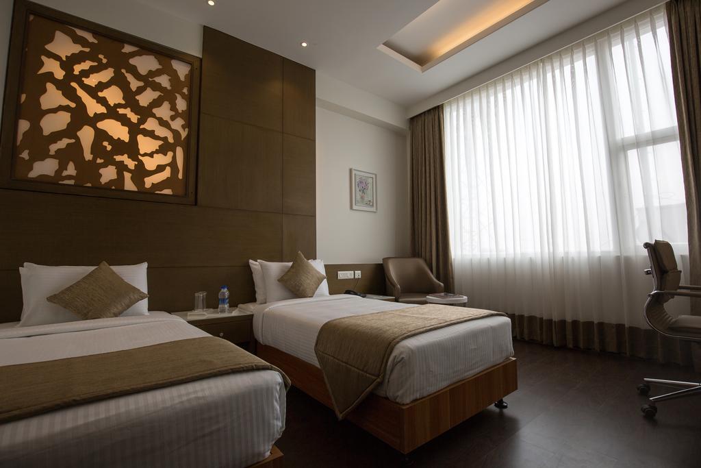 Kiscol Grands Hotel Kojambuttúr Kültér fotó